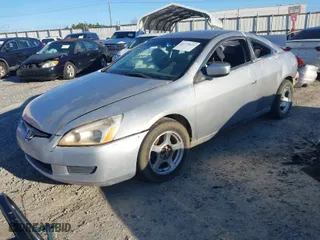 2003 Honda Accord Cpe LX with VIN 1HGCM72203A037137, listed as a IAAI auction lot 41739023 with 283,776 mi miles. Bid and sale history available at carsss.com. Image 2.