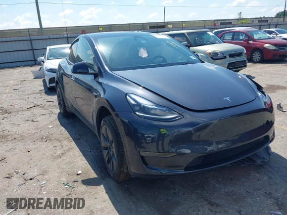 2024 Tesla Model Y with VIN 7SAYGDED9RA321373, listed as a IAAI auction lot 42228491 with 6,452 mi miles and . Bid and sale history available at DreamBid. Image 1.