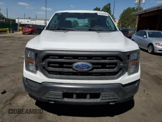 2023 Ford F-150 XL with VIN 1FTFW1E89PKD98613, listed as a Copart auction lot 61860785 with 25,568 mi miles and Salvage title. Bid and sale history available at DreamBid. Image 5.