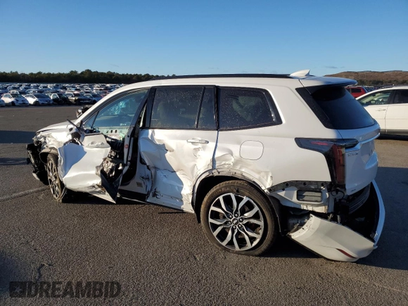 2022 Cadillac XT6 Sport with VIN 1GYKPHRS1NZ131085, listed as a Copart auction lot 87600915 with 23,251 mi miles and Salvage Title. Bid and sale history available at carsss.com. Image 2.
