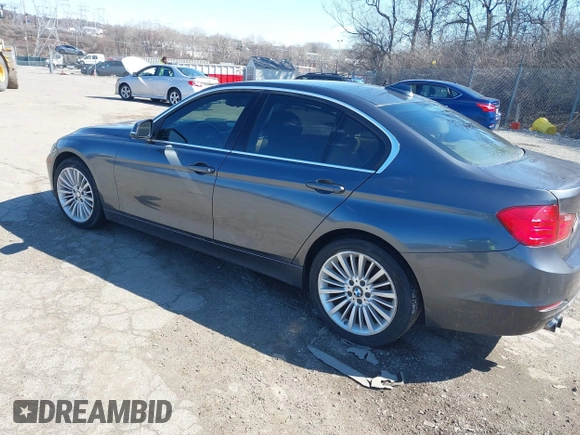 2012 BMW 3 Series 328i with VIN WBA3A5C53CF256338, listed as a IAAI auction lot 41758662 with 99,607 mi miles. Bid and sale history available at carsss.com. Image 3.