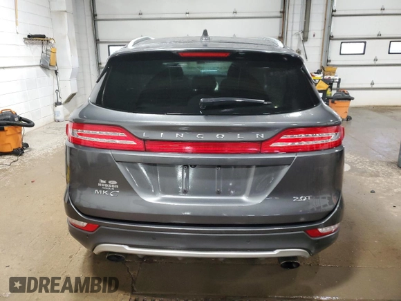 2018 Lincoln MKC Premiere with VIN 5LMCJ1C98JUL04240, listed as a Copart auction lot 48902405 with 80,186 mi miles and Salvage Title. Bid and sale history available at DreamBid. Image 6.