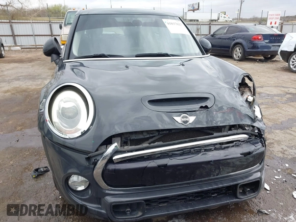 2017 MINI Hardtop 4 Door Cooper S z VIN WMWXU3C3XH2F49201, wystawiony jako IAAI lot #41837027 z przebiegiem 75 949 mil mil oraz . Historia ofert i sprzedaży dostępna na DreamBid. Obrazek 13.