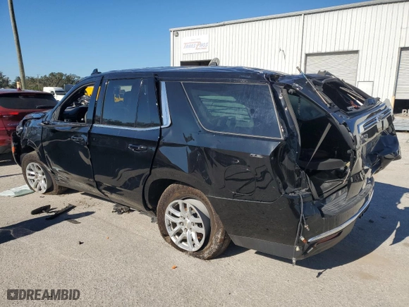 2021 Chevrolet Tahoe Commercial with VIN 1GNSKLED9MR390007, listed as a Copart auction lot 83274554 with 63,602 mi miles and Clean Title. Bid and sale history available at carsss.com. Image 2.