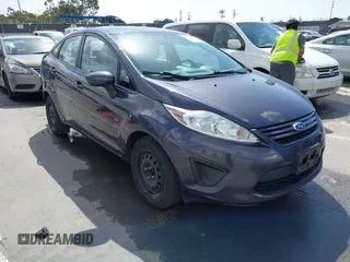 2013 Ford Fiesta S z VIN 3FADP4AJ5DM177518, wystawiony jako IAAI lot #41958334 z przebiegiem 89 741 mil mil oraz . Historia ofert i sprzedaży dostępna na DreamBid. Obrazek 1.