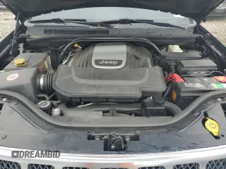 2007 Jeep Grand Cherokee Overland with VIN 1J8HR68227C651830, listed as a Copart auction lot 62403725 with 147,827 mi miles and Salvage title. Bid and sale history available at DreamBid. Image 11.