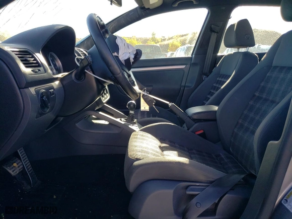2009 Volkswagen GTI with VIN WVWHV71K99W108785, listed as a Copart auction lot 77046864 with 119,799 mi miles and Salvage Title. Bid and sale history available at carsss.com. Image 7.