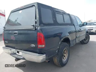 1999 Ford F-150 XL with VIN 1FTRX18L8XNB25526, listed as a IAAI auction lot 41970764 with 1 mi miles. Bid and sale history available at carsss.com. Image 4.
