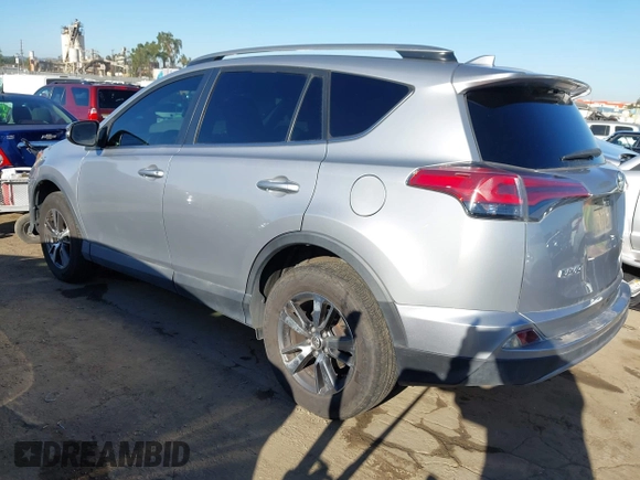 2018 Toyota RAV4 XLE with VIN 2T3WFREV8JW474230, listed as a IAAI auction lot 42687475 with 182,264 mi miles and . Bid and sale history available at DreamBid. Image 3.