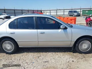 1998 Infiniti I30 Standard with VIN JNKCA21A9WT615911, listed as a IAAI auction lot 41904788 with 216,340 mi miles. Bid and sale history available at carsss.com. Image 13.