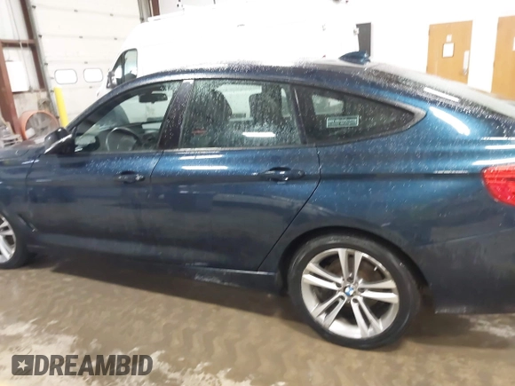 2014 BMW 3 Series 328i Gran Turismo xDrive with VIN WBA3X5C5XED557668, listed as a IAAI auction lot 41728522 with 123,393 mi miles and . Bid and sale history available at DreamBid. Image 14.