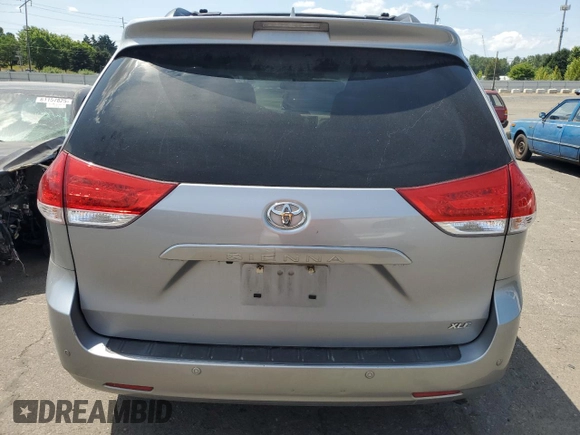 2012 Toyota Sienna XLE AAS with VIN 5TDYK3DC0CS194193, listed as a Copart auction lot 60265455 with 139,246 mi miles and Salvage title. Bid and sale history available at DreamBid. Image 6.