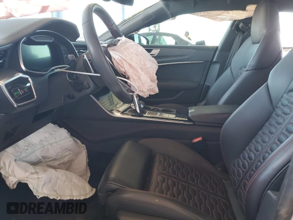 2022 Audi RS 7 z VIN WUAPCBF27NN902149, wystawiony jako Copart lot #54994225 z przebiegiem 12 848 mil mil oraz Szkoda całkowita • Salvage title. Historia ofert i sprzedaży dostępna na DreamBid. Obrazek 7.