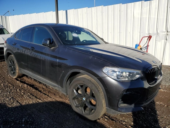2020 BMW X4 xDrive30i with VIN 5UX2V1C02LLE67937, listed as a Copart auction lot 70302802 with 30,553 mi miles. Bid and sale history available at carsss.com. Image 4.