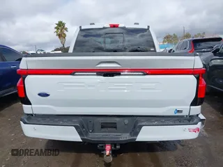 2023 Ford F-150 Lightning Pro with VIN 1FTVW1EV3PWG60491, listed as a IAAI auction lot 41507485 with 19,148 mi miles and . Bid and sale history available at DreamBid. Image 17.