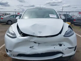 2022 Tesla Model Y Long Range with VIN 7SAYGDEE2NF403354, listed as a IAAI auction lot 41986216 with 53,177 mi miles and . Bid and sale history available at DreamBid. Image 12.
