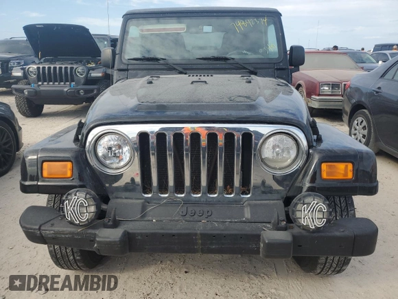 2003 Jeep Wrangler X with VIN 1J4FA39S33P364688, listed as a Copart auction lot 74842374 with Not Provided miles and Non Repairable. Bid and sale history available at carsss.com. Image 5.