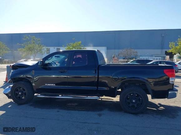 2008 Toyota Tundra 2WD Truck with VIN 5TFRU54128X010267, listed as a IAAI auction lot 41344661 with 104,141 mi miles. Bid and sale history available at carsss.com. Image 14.
