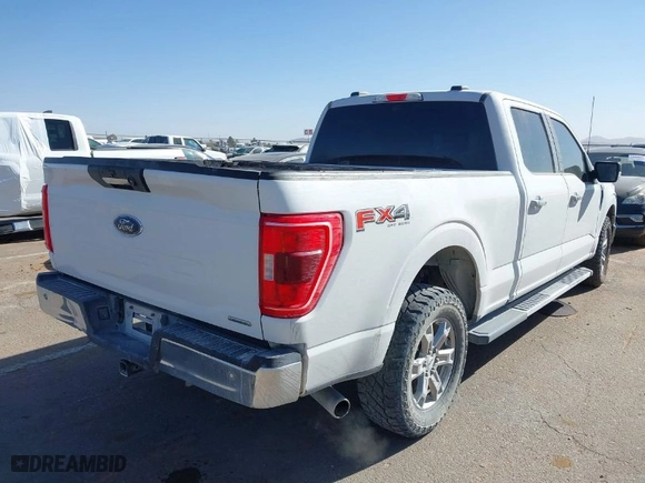 2021 Ford F-150 XL with VIN 1FTFW1E86MFC72651, listed as a IAAI auction lot 41840341 with 100,645 mi miles. Bid and sale history available at carsss.com. Image 4.