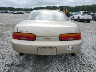 1993 Lexus SC with VIN JT8JZ31C8P0016752, listed as a Copart auction lot 65764515 with 146,935 mi miles and Clean title. Bid and sale history available at DreamBid. Image 6.