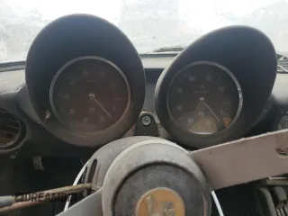 1978 Alfa Romeo Spider z VIN 115410002071, wystawiony jako Copart lot #75574404 z przebiegiem 50 587 mil mil oraz Tytuł czysty. Historia ofert i sprzedaży dostępna na DreamBid. Obrazek 9.