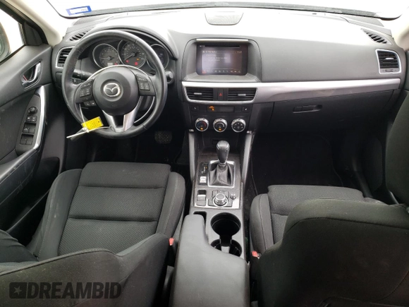 2016 Mazda CX-5 Touring with VIN JM3KE2CY4G0882671, listed as a Copart auction lot 51089555 with 50,951 mi miles and Salvage Title. Bid and sale history available at carsss.com. Image 8.