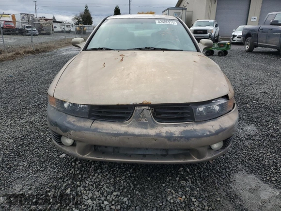 2003 Mitsubishi Galant ES z VIN 4A3AA46G43E093624, wystawiony jako Copart lot #82406974 z przebiegiem 177 012 mil mil oraz Szkoda całkowita • Salvage title. Historia ofert i sprzedaży dostępna na DreamBid. Obrazek 5.