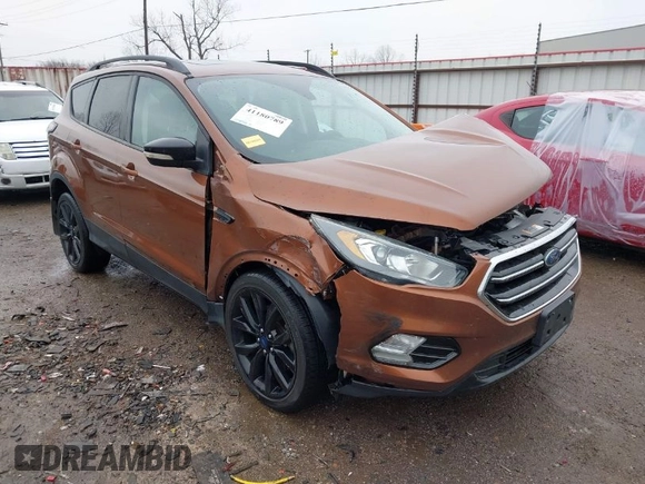 2017 Ford Escape Titanium with VIN 1FMCU9J99HUB75687, listed as a IAAI auction lot 41180789 with 108,967 mi miles. Bid and sale history available at carsss.com. Image 1.