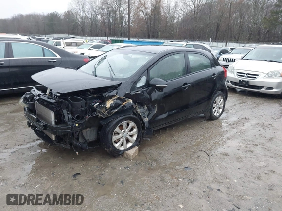 2012 Kia Rio EX with VIN KNADN5A39C6013756, listed as a IAAI auction lot 41560330 with 157,365 mi miles. Bid and sale history available at carsss.com. Image 2.