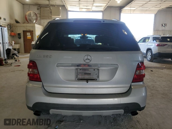 2006 Mercedes-Benz M 350 with VIN 4JGBB86E06A063702, listed as a Copart auction lot 49534645 with 131,073 mi miles and Clean Title. Bid and sale history available at DreamBid. Image 6.