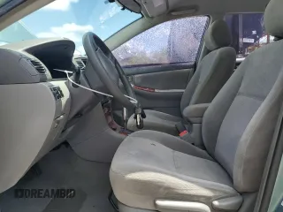 2005 Toyota Corolla CE z VIN 1NXBR30E55Z459127, wystawiony jako Copart lot #52296195 z przebiegiem 133 289 mil mil oraz Szkoda całkowita • Salvage title. Historia ofert i sprzedaży dostępna na DreamBid. Obrazek 7.