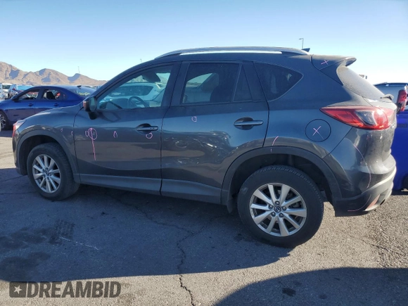 2016 Mazda CX-5 Touring with VIN JM3KE2CYXG0906293, listed as a Copart auction lot 46484185 with 89,544 mi miles and Salvage Title. Bid and sale history available at carsss.com. Image 2.