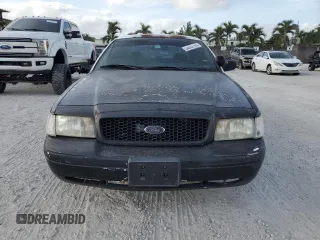 2005 Ford Police Interceptor with VIN 2FAFP71W35X128684, listed as a Copart auction lot 54002165 with 144,766 mi miles and Clean title. Bid and sale history available at DreamBid. Image 5.