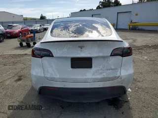 2022 Tesla Model Y Performance с VIN 7SAYGDEF2NF405596, выставлен на аукционе Copart как лот 52868195 с пробегом Не указан миль и Списание • Salvage title. История ставок и продаж доступна на DreamBid. Изображение 6.