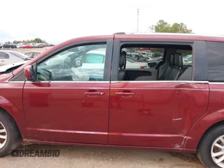 2019 Dodge Grand Caravan SXT with VIN 2C4RDGCGXKR585563, listed as a IAAI auction lot 40949350 with 122,577 mi miles and . Bid and sale history available at DreamBid. Image 15.