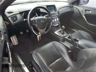 2013 Hyundai Genesis Coupe Grand Touring z VIN KMHHU6KJXDU091854, wystawiony jako Copart lot #56275895 z przebiegiem 113 625 mil mil oraz Szkoda całkowita • Salvage title. Historia ofert i sprzedaży dostępna na DreamBid. Obrazek 8.