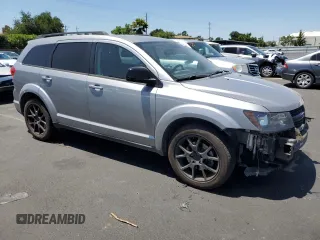 2017 Dodge Journey SXT z VIN 3C4PDCBG7HT547666, wystawiony jako Copart lot #57987875 z przebiegiem 124 484 mil mil oraz Szkoda całkowita • Salvage title. Historia ofert i sprzedaży dostępna na DreamBid. Obrazek 4.