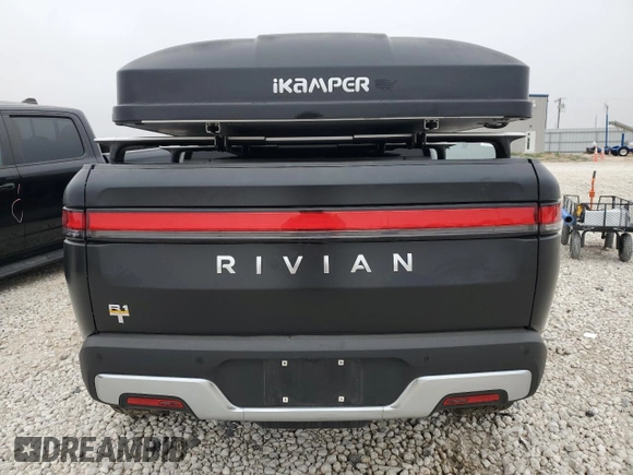 2022 Rivian R1T Adventure z VIN 7FCTGAAA5NN015734, wystawiony jako Copart lot #44019715 z przebiegiem 27 542 mil mil oraz Szkody całkowita. Historia ofert i sprzedaży dostępna na DreamBid. Obrazek 6.