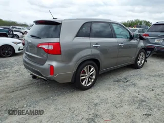 2014 Kia Sorento SX with VIN 5XYKWDA79EG440486, listed as a IAAI auction lot 41918486 with 167,288 mi miles and . Bid and sale history available at DreamBid. Image 4.