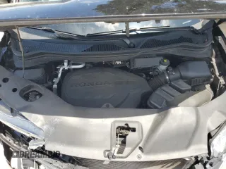 2021 Honda Passport EX-L with VIN 5FNYF7H58MB005187, listed as a Copart auction lot 60414535 with 75,208 mi miles and Salvage title. Bid and sale history available at DreamBid. Image 12.