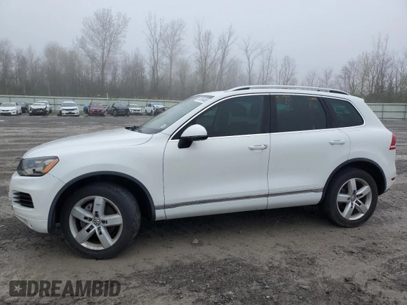 2012 Volkswagen Touareg Sport with VIN WVGEF9BP2CD010668, listed as a Copart auction lot 55306485 with 166,255 mi miles and Clean Title. Bid and sale history available at DreamBid. Image 1.