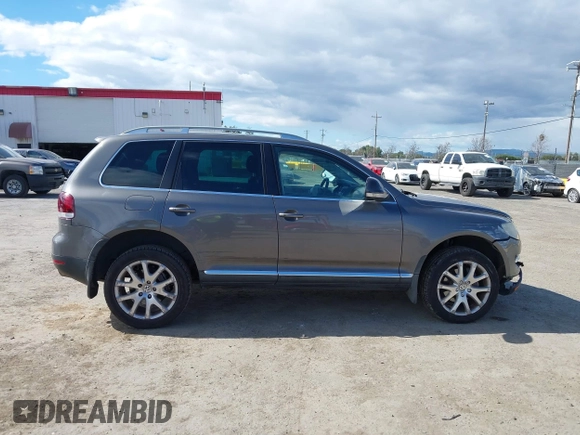 2010 Volkswagen Touareg VR6 with VIN WVGBF7A96AD002466, listed as a IAAI auction lot 41709052 with 204,819 mi miles and . Bid and sale history available at DreamBid. Image 13.