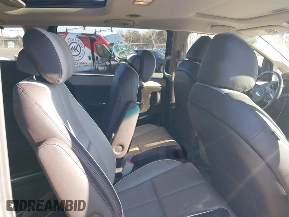 2015 Kia Sedona SX-L with VIN KNDME5C16F6039671, listed as a IAAI auction lot 41736237 with 113,035 mi miles and . Bid and sale history available at DreamBid. Image 8.