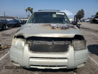 2004 Ford Escape Limited with VIN 1FMCU94194KB23763, listed as a Copart auction lot 59710045 with Not provided miles and Non repairable. Bid and sale history available at DreamBid. Image 5.