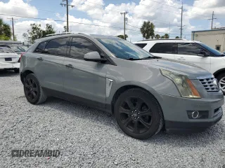 2014 Cadillac SRX Premium Collection z VIN 3GYFNGE30ES627895, wystawiony jako Copart lot #58605985 z przebiegiem 49 300 mil mil oraz Szkoda całkowita • Salvage title. Historia ofert i sprzedaży dostępna na DreamBid. Obrazek 4.
