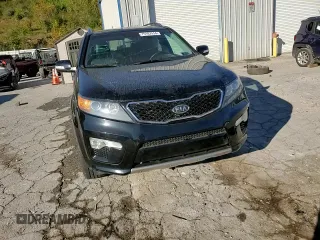 2013 Kia Sorento SX z VIN 5XYKWDA24DG385142, wystawiony jako Copart lot #75187514 z przebiegiem 119 027 mil mil oraz Szkoda całkowita • Salvage title. Historia ofert i sprzedaży dostępna na DreamBid. Obrazek 11.