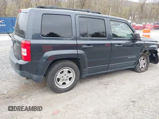 2014 Jeep Patriot Sport with VIN 1C4NJPBB7ED822885, listed as a IAAI auction lot 41947079 with 76,740 mi miles. Bid and sale history available at carsss.com. Image 4.