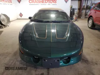 1995 Pontiac Firebird Trans Am z VIN 2G2FV32P3S2211318, wystawiony jako Copart lot #60168445 z przebiegiem 91 250 mil mil oraz Czysty tytuł • Clean title. Historia ofert i sprzedaży dostępna na DreamBid. Obrazek 5.