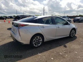 2016 Toyota Prius Four z VIN JTDKARFU0G3500883, wystawiony jako Copart lot #55211615 z przebiegiem 117 528 mil mil oraz Czysty tytuł • Clean title. Historia ofert i sprzedaży dostępna na DreamBid. Obrazek 3.