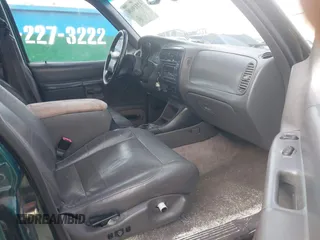1999 Ford Explorer XLT z VIN 1FMZU32E7XZB57306, wystawiony jako IAAI lot #41519800 z przebiegiem 226 932 mil mil oraz . Historia ofert i sprzedaży dostępna na DreamBid. Obrazek 5.